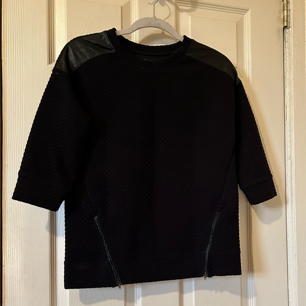 Black quilted 3/4 sleeve sweater with zipper and faux leather accents